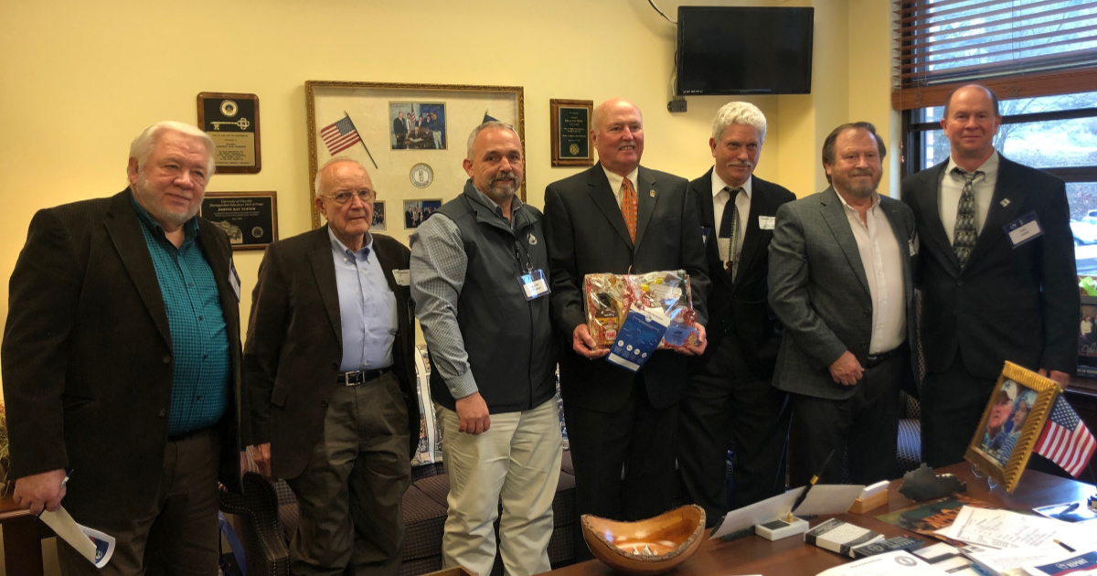 Kentucky Senator Johnny Ray Turner receives a basket of Kentucky agricultural products from Kentucky Farm Bureau. Kentucky Senator Johnny Ray Turner receives a basket of Kentucky agricultural products from Kentucky Farm Bureau.