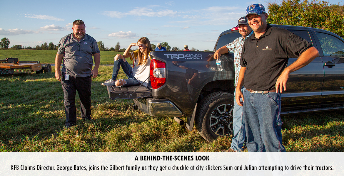 KFB Claims Director, George Bates, joins the Gilbert family as they get a chuckle at city slickers Sam and Julian attempting to drive their tractors.