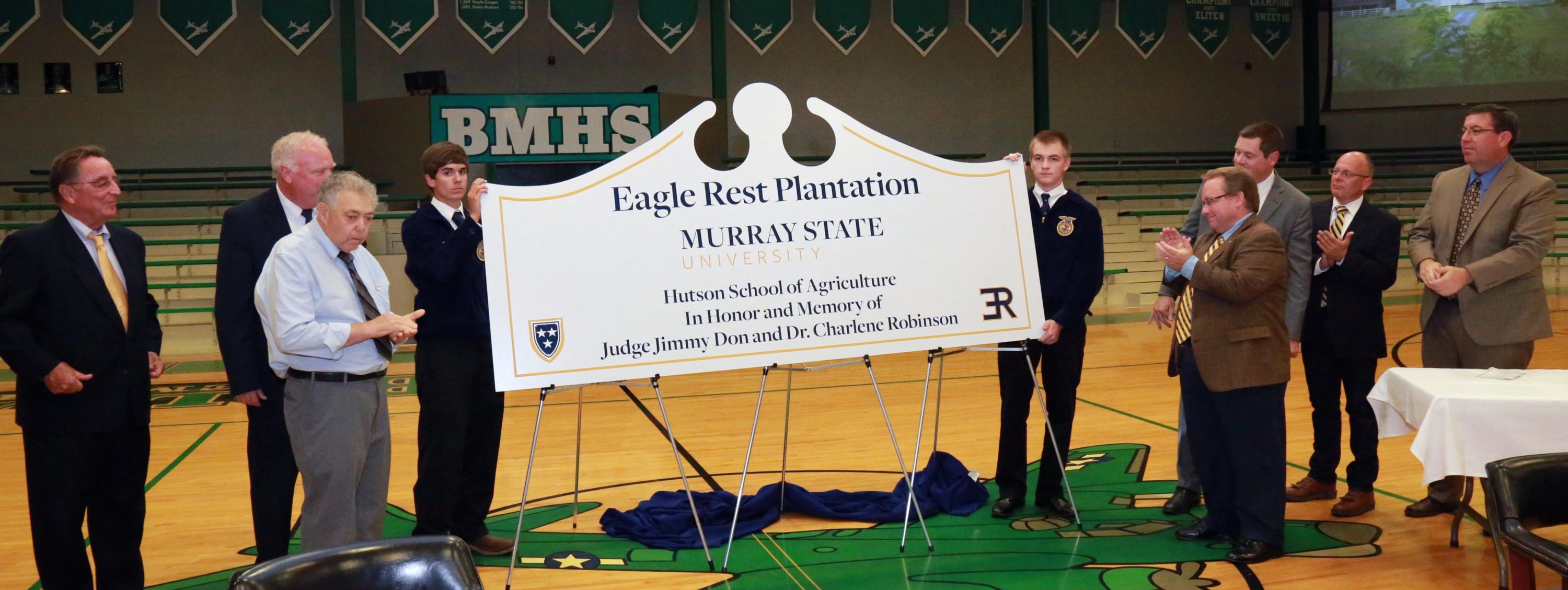 A sign honoring Judge and Dr. Robinson was unveiled at the ceremony and will be placed on the property A sign honoring Judge and Dr. Robinson was unveiled at the ceremony and will be placed on the property