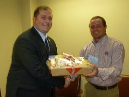 State Senator Whitney Westerfield receives a food basket of Kentucky agricultural food products from Logan County Farm Bureau President Jeremy Robertson State Senator Whitney Westerfield receives a food basket of Kentucky agricultural food products from Logan County Farm Bureau President Jeremy Robertson