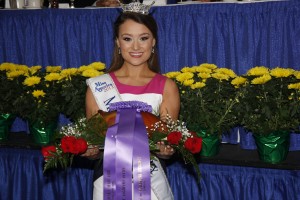 Miss Kentucky Jenna Day displays the blue ribbon ham from Harper’s.