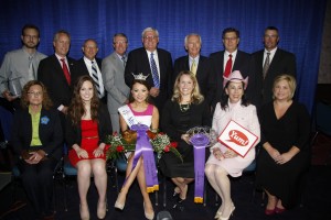 Front row from left: Harper’s Country Hams co-owner Dolores Harper, Sydney Bright, Miss Kentucky Jenna Day, Angela Osting of Yum! Foundation, Barbara Sexton-Smith of the Funds for the Arts and Jennifer Osborne of Yum! Brands. Back row from left are Harper’s Country Hams co-owner Brian Harper, Louisville Mayor Greg Fischer, KFB Executive Committee members Fritz Giesecke, Eddie Melton and Mark Haney, Governor Steve Beshear, KFB Executive VP David S. Beck and KFB Commodity Division Director Mike Tobin.