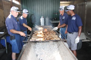 Jeff Schum, Carl Russell, Tom Watson, and Larry Alvis cook chops for a recent event at the Kentucky Exposition Center. Jeff Schum, Carl Russell, Tom Watson, and Larry Alvis cook chops for a recent event at the Kentucky Exposition Center.