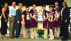 Owen County High School's Cuisine Rebels culinary team won the second annual Kentucky Proud Junior Chef competition Friday. Participating in the trophy presentation were, from left: Tina Garland, Farm to School coordinator for the Kentucky Department of Agriculture; Agriculture Commissioner James Comer; Janey Thornton, Deputy Under Secretary for USDA's Food, Nutrition, and Consumer Services and a Kentucky native; team members Carley Bennett, Morgan Woodyard, Kadee Carter, Hailey Chappell, and Cannon Goodrich; and Samantha Benjamin-Kirk with the USDA Southeast Regional Office's Farm to School Program. The Owen County team was coached by Kim Webster. (Kentucky Department of Agriculture photo)